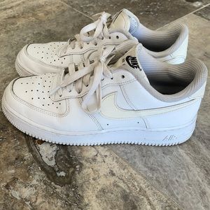 nike air force ones. white with cream swoosh! in really good used condition.